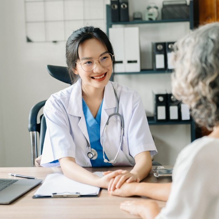 The doctor holds the patient’s. hand Healthcare and medical concept.